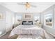 Bright bedroom with a king-size bed and ample natural light at 5245 W 97Th Ave, Broomfield, CO 80020