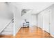 Modern staircase with metal railing and hardwood floors at 5245 W 97Th Ave, Broomfield, CO 80020