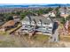 This elegant house features an outdoor deck, garden, and attractive color scheme at 6854 Carr St, Arvada, CO 80004