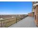 Expansive backyard view from the deck, showcasing the city skyline and neighborhood at 6854 Carr St, Arvada, CO 80004