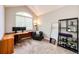 Bright office space featuring a desk setup, workout area and modern decor at 8500 E Jefferson Ave # 19B, Denver, CO 80237