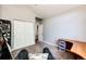 Bright office space featuring a desk setup, work out area and neutral walls at 8500 E Jefferson Ave # 19B, Denver, CO 80237