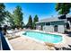 A community pool featuring lounge chairs and a well-maintained pool deck for residents at 8500 E Jefferson Ave # 19B, Denver, CO 80237