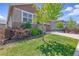 Charming two-story home featuring a stone facade, two-car garage, and well-maintained landscaping at 8844 S Sicily Ct, Aurora, CO 80016