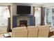 Comfortable living space with fireplace, and abundant natural light, perfect for relaxation and entertainment at 8844 S Sicily Ct, Aurora, CO 80016