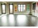 Bright dance studio with hardwood floors, ballet bar, mirrors and natural light at 8844 S Sicily Ct, Aurora, CO 80016