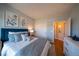 Bright bedroom with neutral walls, hardwood floors, and ample closet space for modern living at 367 Josef Cir, Fort Lupton, CO 80621