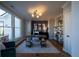 Stylish office with shelving, a desk, and large window offering natural light at 367 Josef Cir, Fort Lupton, CO 80621