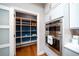 Spacious pantry with ample shelving and stainless steel double oven and microwave at 367 Josef Cir, Fort Lupton, CO 80621