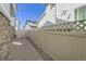 Well-maintained backyard with fence, gravel, and stone pathway at 8833 Meade St, Westminster, CO 80031