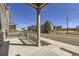 View of neighborhood from a front porch with concrete base and a rail at 8833 Meade St, Westminster, CO 80031