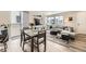 Open-concept living space with a kitchen, dining area, and living room, perfect for entertaining at 8833 Meade St, Westminster, CO 80031