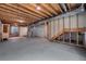 Unfinished basement with visible utilities and exposed framework, offering potential for customization at 5237 S Malaya Way, Centennial, CO 80015