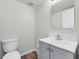 This bathroom features a modern sink, wood floors, and a neutral wall color at 5237 S Malaya Way, Centennial, CO 80015