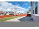 Long concrete driveway with ample parking and a privacy fence at 5237 S Malaya Way, Centennial, CO 80015