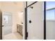 Clean bathroom with walk-in shower and tile flooring at 9639 Browns Peak Cir, Littleton, CO 80125