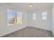 Bright bedroom with carpet flooring and city views at 9639 Browns Peak Cir, Littleton, CO 80125