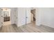 Spacious bedroom with access to bathroom and stairs at 9639 Browns Peak Cir, Littleton, CO 80125
