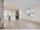 Modern kitchen with granite countertops and stainless steel appliances at 9639 Browns Peak Cir, Littleton, CO 80125