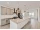 Modern kitchen with granite countertops and stainless steel appliances at 9639 Browns Peak Cir, Littleton, CO 80125
