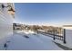 Spacious rooftop deck with mountain views and snow at 9639 Browns Peak Cir, Littleton, CO 80125