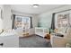 Charming Bedroom with mountain mural, a bright window, and cozy carpet at 1351 Reed St, Lakewood, CO 80214