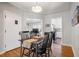 Cozy dining room featuring hardwood floors and plenty of natural light at 1351 Reed St, Lakewood, CO 80214