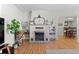 Bright and spacious living room with hardwood floors and large windows at 1351 Reed St, Lakewood, CO 80214