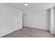 Neutral bedroom features a large closet and a door leading to another room at 6102 E Yale Ave, Denver, CO 80222