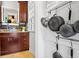 Kitchen showing the cabinets, window and mounted pot rack at 3319 E 27Th Ave, Denver, CO 80205