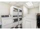 Bright laundry room featuring multiple washers and dryers for community use at 789 N Clarkson St # 406, Denver, CO 80218