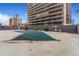 Community pool covered for the off-season with a no diving warning on the concrete surround at 789 N Clarkson St # 406, Denver, CO 80218