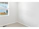 Bright bedroom features a window with blinds. The room also has neutral carpet at 571 Homestead Ave, Brighton, CO 80601