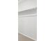 Walk-in closet with ample storage space and neutral carpeting at 571 Homestead Ave, Brighton, CO 80601