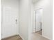 Bright entryway with neutral walls and flooring and white doors at 571 Homestead Ave, Brighton, CO 80601