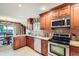 Kitchen featuring stainless steel appliances and granite countertops at 3544 Dyanna Dr, Thornton, CO 80241