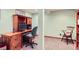 Cozy home office with a wood desk, chair, and computer setup for comfortable work at home at 3544 Dyanna Dr, Thornton, CO 80241