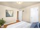 Comfortable bedroom with hardwood floors, fresh paint and bright sunlight at 2686 S Gilpin St, Denver, CO 80210