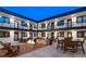 Beautifully styled courtyard with grill and tables at 2120 N Downing St # 216, Denver, CO 80205
