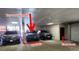 Designated parking space in a well-lit parking garage at 2120 N Downing St # 216, Denver, CO 80205