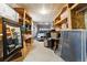 Spacious two-car garage with ample storage shelves and room for projects at 9816 W Freiburg Dr # A, Littleton, CO 80127