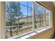 This stunning large window shows views of the outside landscape at 9816 W Freiburg Dr # A, Littleton, CO 80127