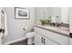 Half bath features modern vanity and fixtures at 2226 S Galapago St, Denver, CO 80223