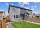 Beautiful exterior view of this two story home featuring modern architecture, stone accents, and well-maintained lawn at 2226 S Galapago St, Denver, CO 80223