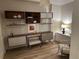 Home office with a modern shelving unit and a white leather chair at 1975 N Grant # 310, Denver, CO 80203