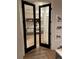Home office with modern glass doors and art on the wall at 1975 N Grant # 310, Denver, CO 80203