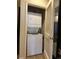 Convenient laundry closet featuring a stacked washer and dryer unit at 1975 N Grant # 310, Denver, CO 80203
