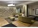 Lobby featuring ample seating, accent wall, and sleek lighting at 1975 N Grant # 310, Denver, CO 80203