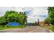 Arvada Center sign, landscape, and curved road at 8408 W 52Nd Ave, Arvada, CO 80002