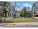 Charming single-story home with mature landscaping, a well-maintained lawn, and a contemporary design at 1423 S Eudora St, Denver, CO 80222